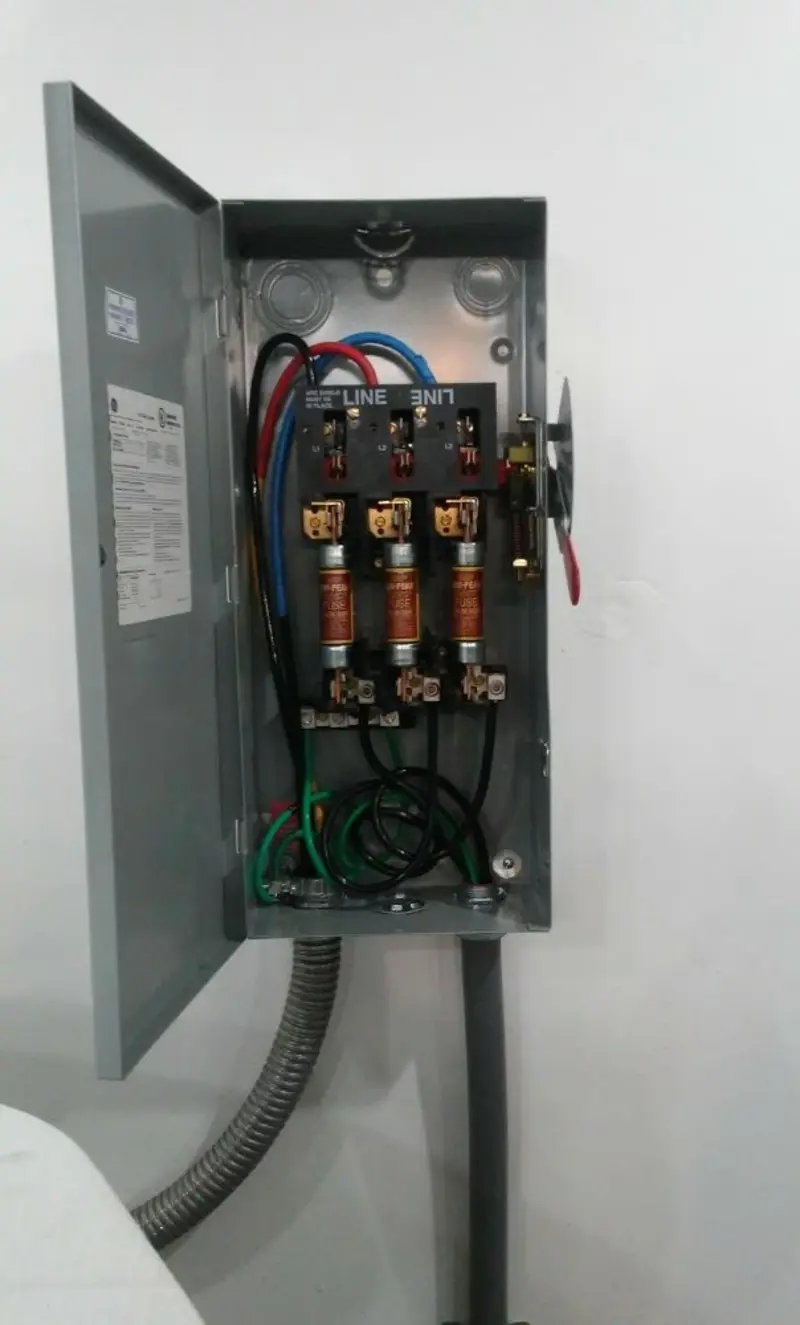 Three-phase disconnect switch installed for Smoke Detector Installation in Palm Bay